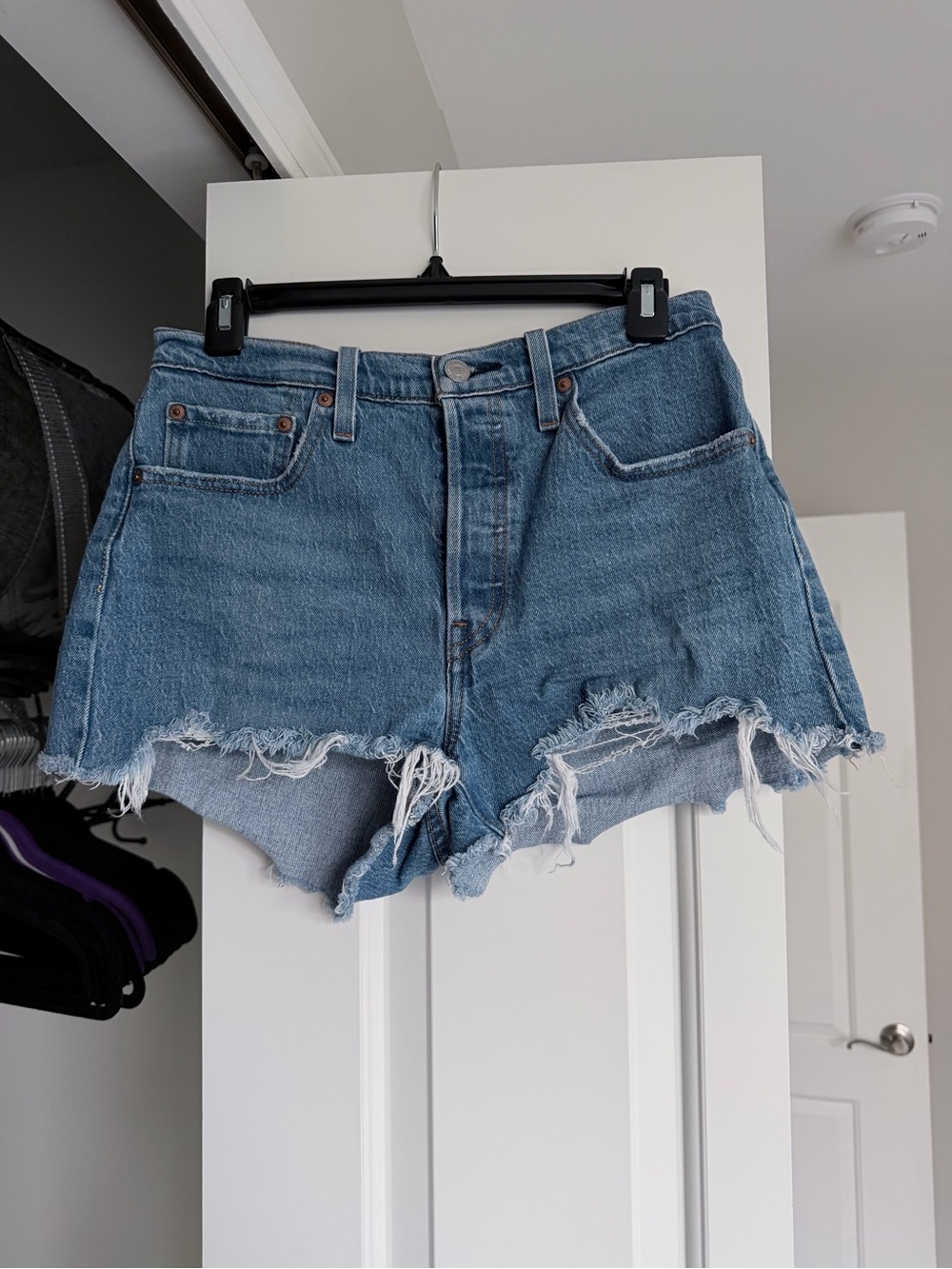 Levi's Light Blue Frayed Hem Denim Shorts